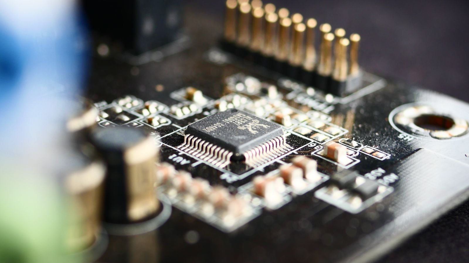 Detailed close-up view of a microchip on a circuit board, representing algorithmic trading signal generation